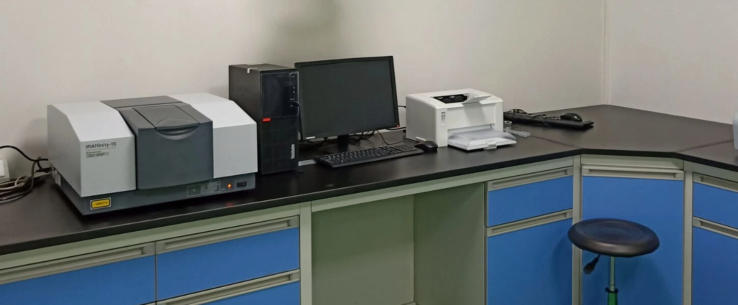 Analytical instrument and computer at a laboratory workstation